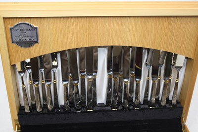 Lot 235 - A Guy Degrenne of France 12-place setting...