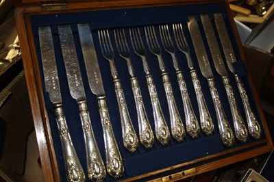 Lot 240 - An Edwardian cased 12-place setting of silver...