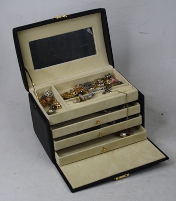 Lot 292 - A leather clad jewellery box and contents, to...