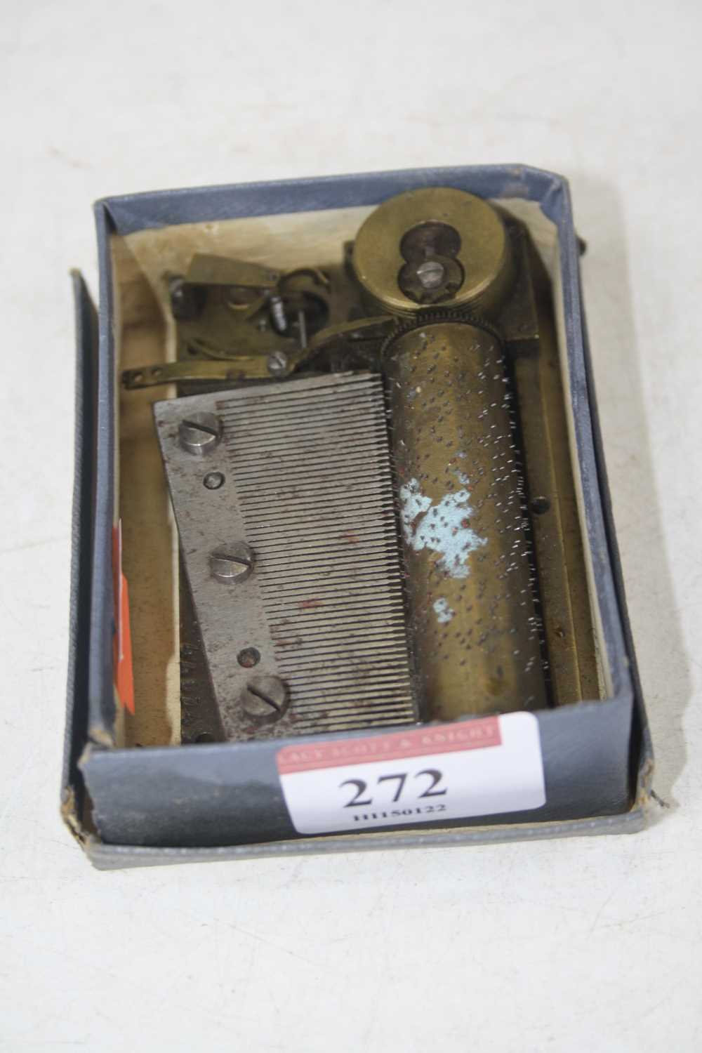 Lot 272 - A circa 1900 miniature mechanical music box...