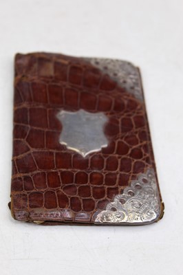 Lot 369 - A late Victorian leather wallet having silver...