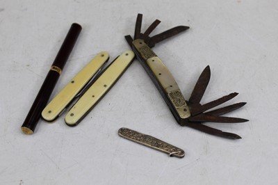 Lot 374 - A 19th century pocket knife having ten various...