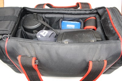 Lot 469 - A Praktica BC1 SLR camera and accessories in case