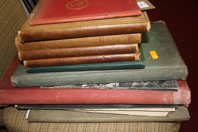 Lot 453 - A small collection of books, to include...
