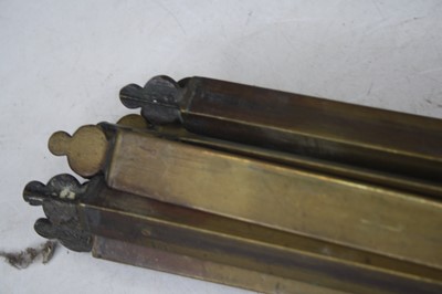 Lot 497 - A quantity of Victorian brass stair rods, each...