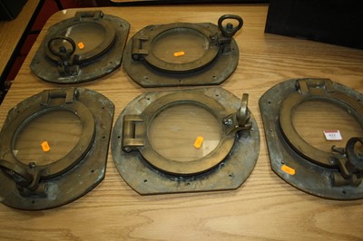 Lot 621 - A set of five brass ships portholes, each...