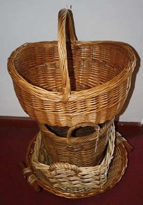 Lot 628 - Four large wicker bread baskets