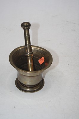 Lot 71 - A Victorian brass pestle & mortar