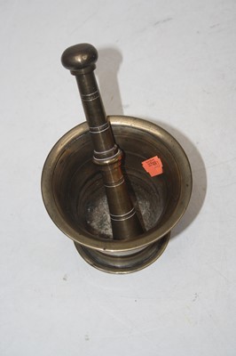 Lot 71 - A Victorian brass pestle & mortar