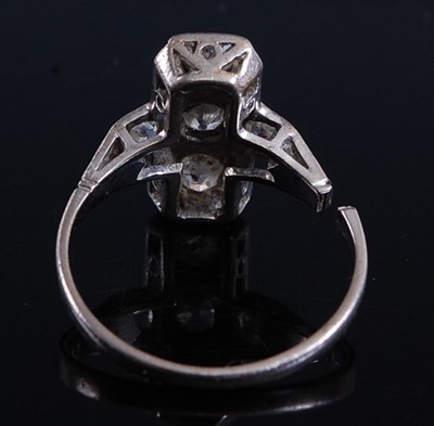 Lot 2160 - A white metal Art Deco diamond panel ring,...