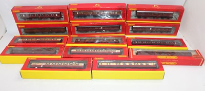 Lot 755 - Fourteen Hornby coaches, assorted. 4 x maroon...