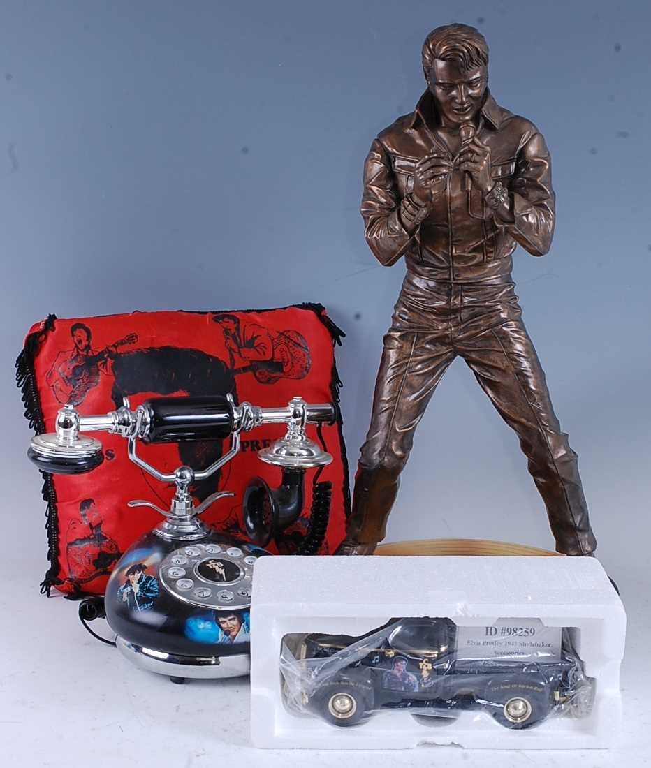 Lot 1164 - Elvis Presley, a collection of memorabilia to...