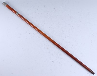 Lot 73 - An early 20th century walking cane, having a...