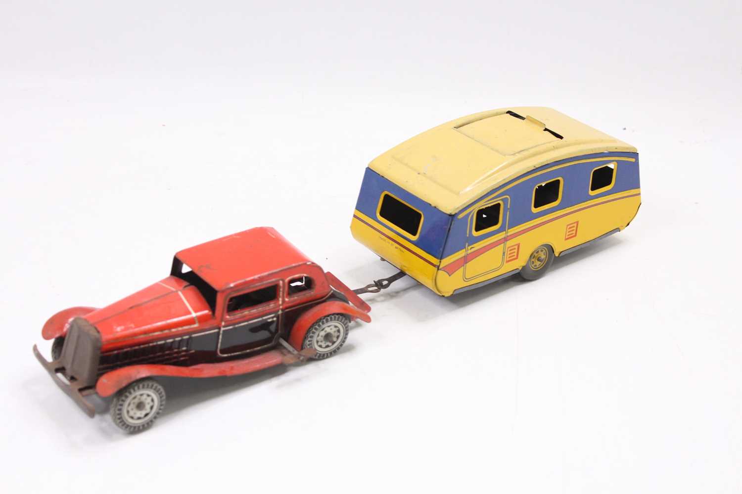 Lot 870 - Mettoy tinplate clockwork saloon car with...