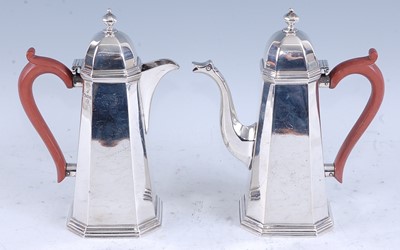 Lot 217 - An Art Deco silver coffee pot and matching hot...