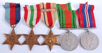 Lot 32 - A collection of five WW II medals, to include...
