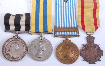 Lot 98 - A collection of eight medals to include...
