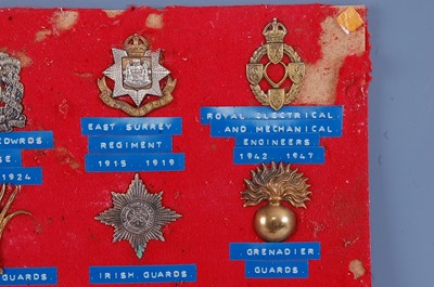 Lot 40 - A collection of assorted cap badges to include...