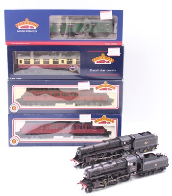 Lot 410 - Two Bachmann BR lined black locos and four...