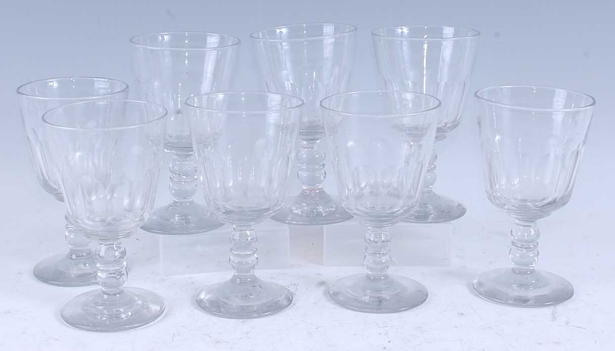 Lot 2098 - A set of eight early Victorian pedestal wine...