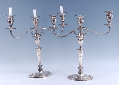 Lot 2126 - A pair of circa 1900 silver plated three-light...