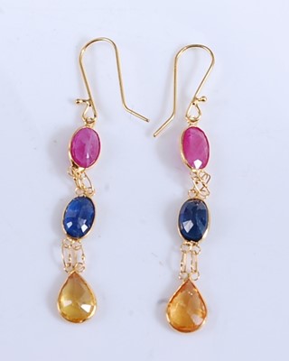 Lot 2187 - A pair of yellow metal sapphire earrings, each...