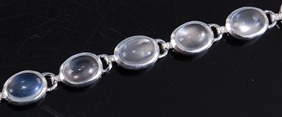 Lot 2505 - A white metal moonstone bracelet, with...