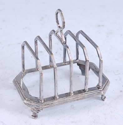 Lot 224 - An Art Deco silver four-division toast rack...
