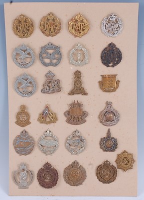 Lot 236 - A collection of cap badges to include Army Air...