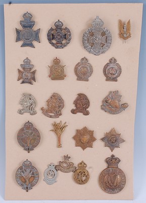 Lot 236 - A collection of cap badges to include Army Air...