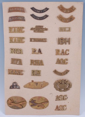 Lot 23 - A collection of cap badges to include 23rd...