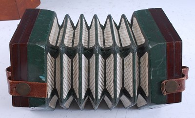 Lot 1007 - A Victorian fret carved rosewood concertina...