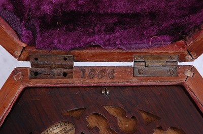 Lot 1007 - A Victorian fret carved rosewood concertina...
