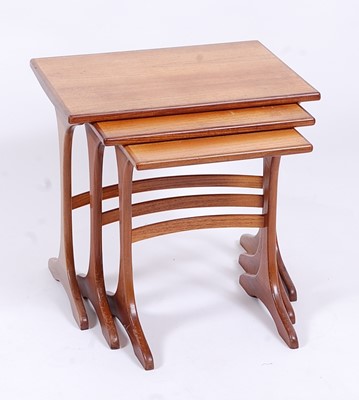 Lot 538 - A 1960s G-Plan teak nest of three occasional...