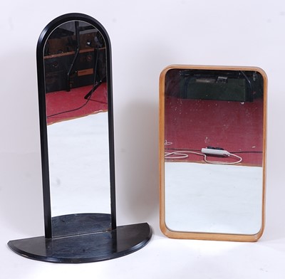 Lot 615 - An Art Deco style black painted arched...