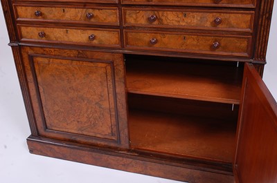Lot 2521 - A Victorian figured walnut bookcase cabinet in...