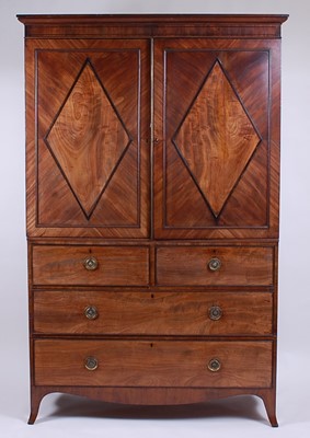 Lot 2465 - A Regency mahogany linenpress, having twin...