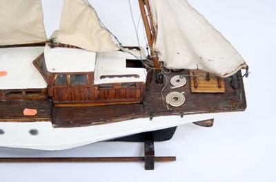 Lot 134 - A scratch-built wooden model of a twin mast...