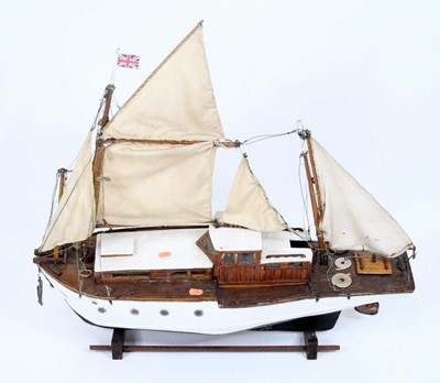 Lot 134 - A scratch-built wooden model of a twin mast...