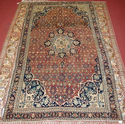 Lot 2445 - A Persian woollen Bidjar carpet, having a rust...