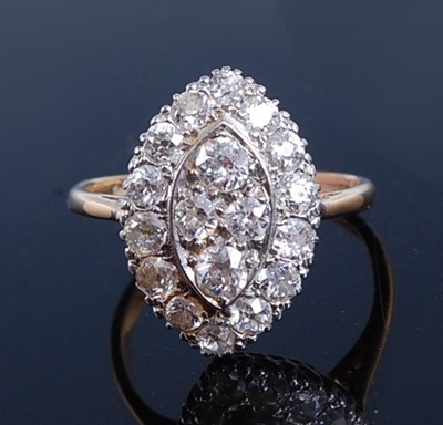 Lot 2195 - A yellow and white metal diamond navette...