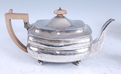 Lot 2112 - A late Georgian silver three-piece tea set,...