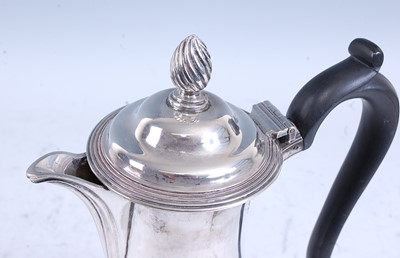 Lot 2136 - An Edwardian silver hot water pot, of slender...