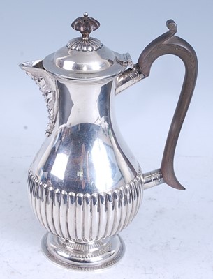 Lot 2138 - An Edwardian silver hot water pot, of...