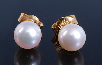 Lot 2521 - A pair of yellow metal cultured pearl stud...