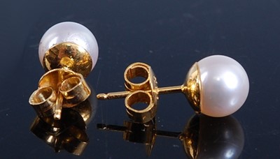 Lot 2521 - A pair of yellow metal cultured pearl stud...