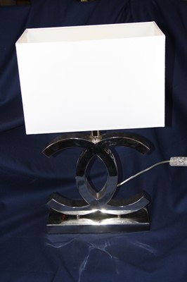 Lot 3 - A modern plated metal table lamp with shade, h....