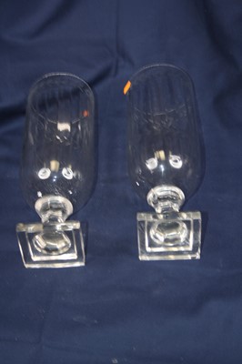 Lot 8 - A pair of modern cut glass hurricane lamps,...
