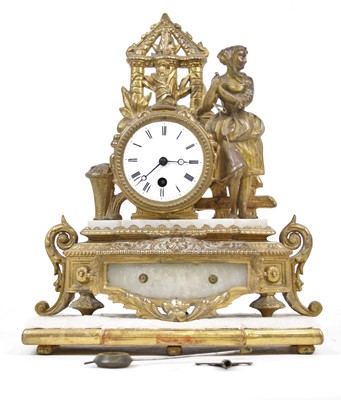 Lot 21 - A 19th century French gilt metal and alabaster...