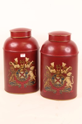 Lot 23 - A pair of reproduction red toleware type...